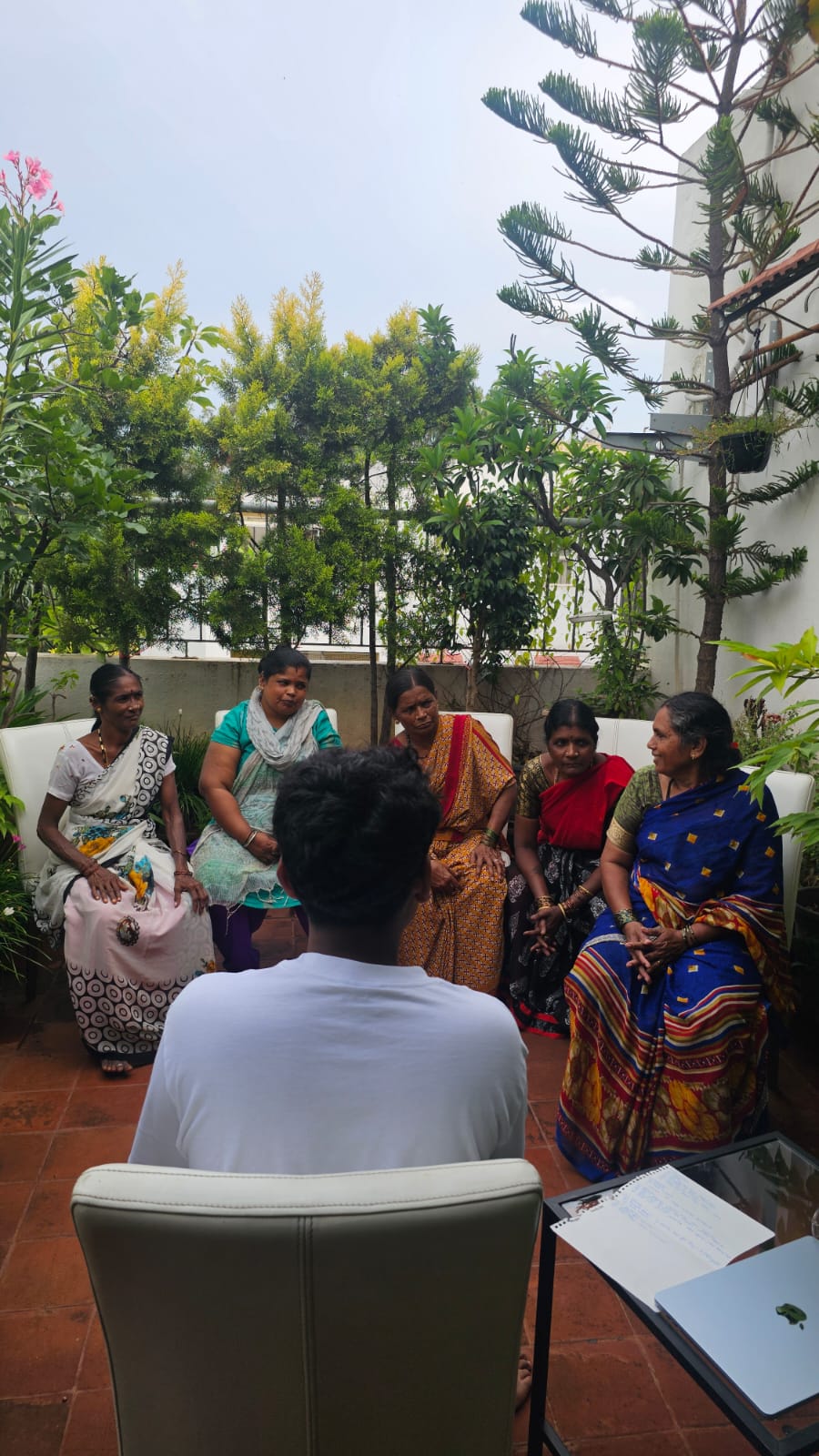 Workshop discussion, Bengaluru — women seated in a circle for a financial literacy session