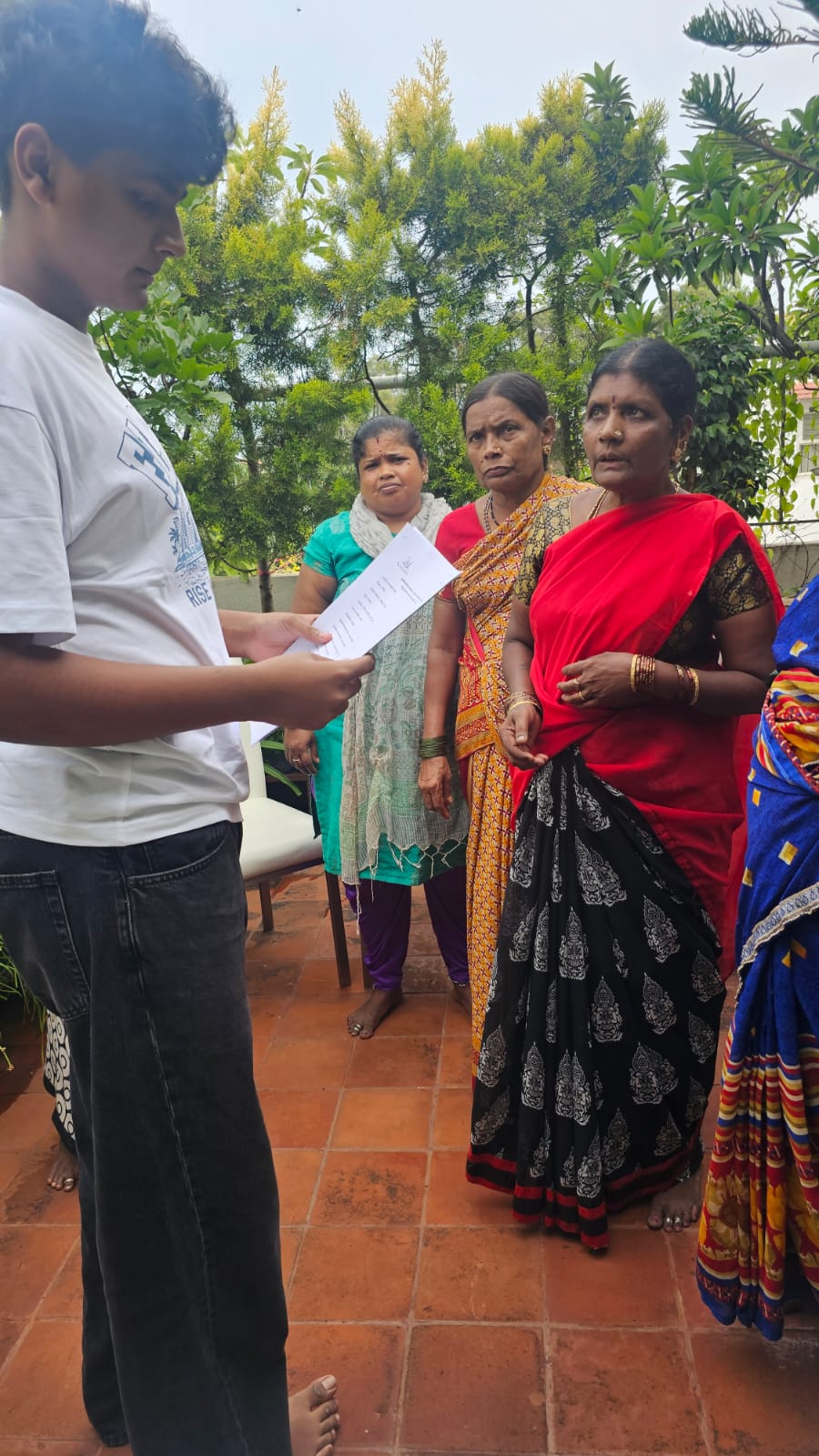 Community outreach — Aayu Mithra Karanth presenting to women participants